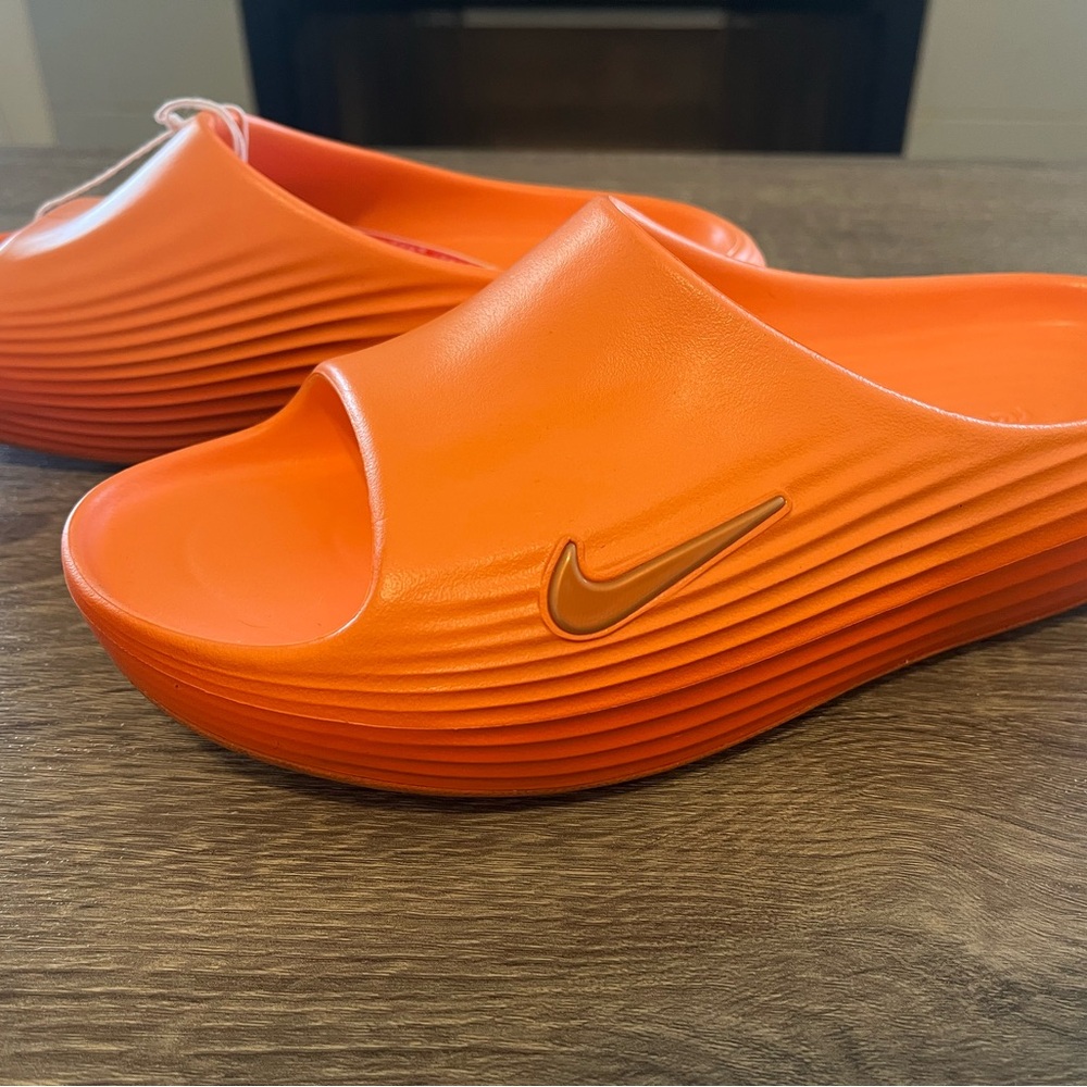 Nike Reactx Rejuvens slide